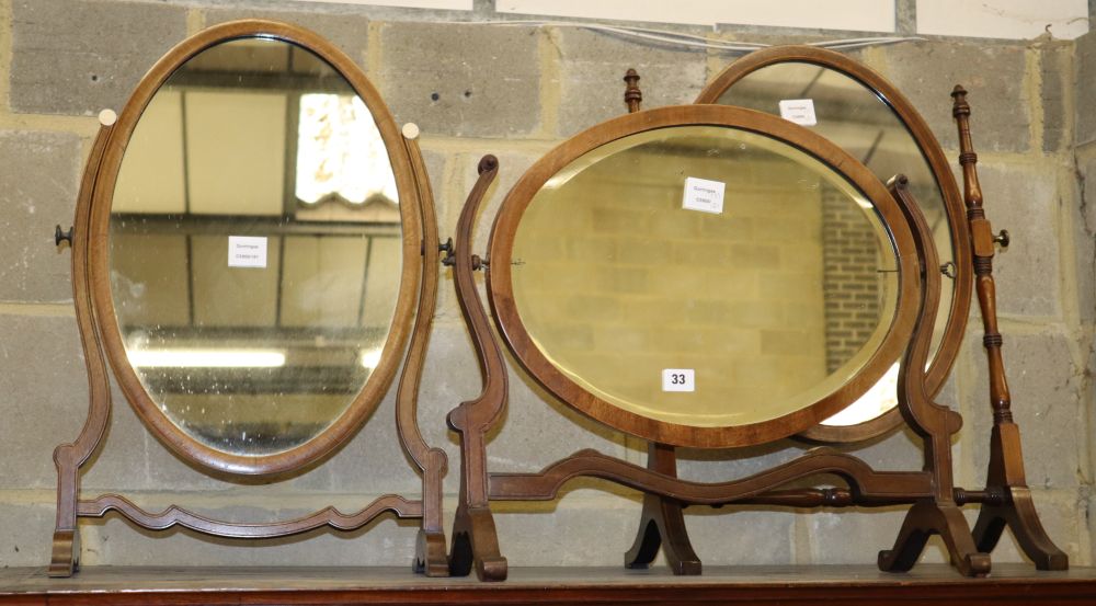 A mahogany skeleton framed toilet mirror with oval plate and two others